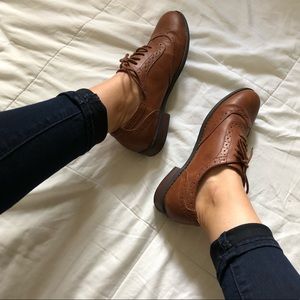 Faux leather lace up oxfords.